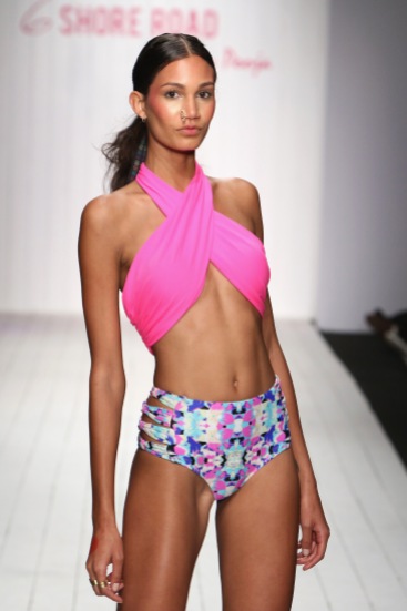 MIAMI BEACH, FL - JULY 17: A model walks the runway at the 6 Shore Road by Pooja Resort 2016 collection during FUNKSHION: Fashion Week Miami Beach Swim at the FUNKSHION Tent on July 17, 2015 in Miami Beach, Florida. (Photo by John Parra/Getty Images for 6 Shore Road by Pooja)