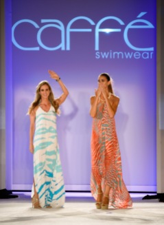 MIAMI BEACH, FL - JULY 18: Designer Paula Saavedra (L) walks the runway with a model at the Caffe Swimwear SS16 Collection during SWIMMIAMI at W South Beach WET on July 18, 2015 in Miami Beach, Florida. (Photo by Frazer Harrison/Getty Images for Caffe Swimwear)
